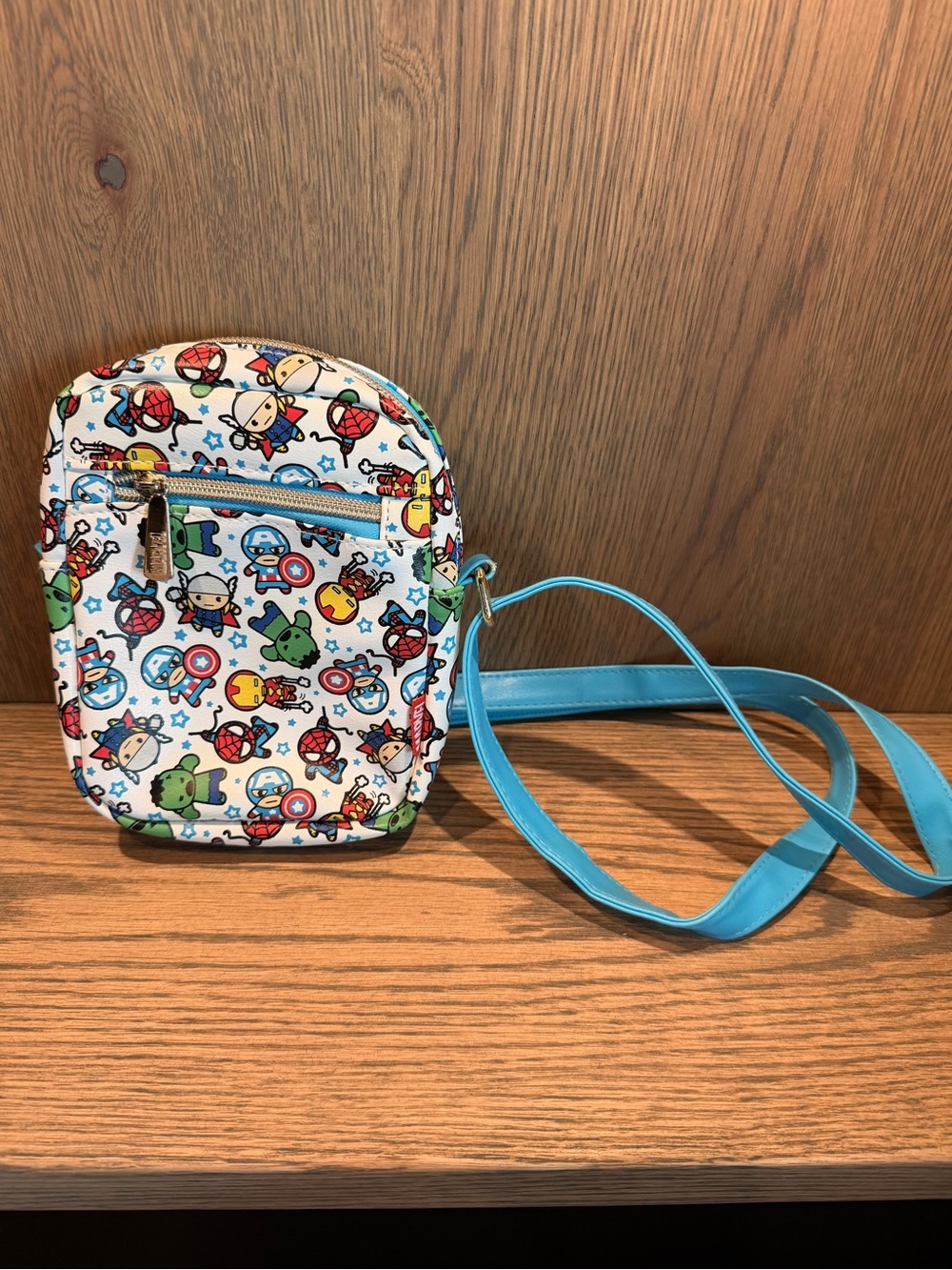 Marvel Light Blue Crossbody Bag with White Tag Accent